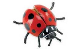 red ladybug toy figurine 