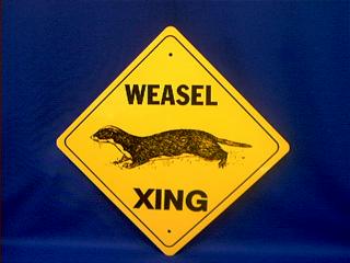 weasel crossing sign