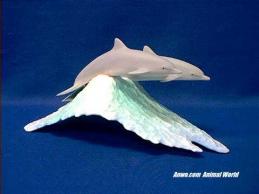john perry dolphins figurine pair on wave 