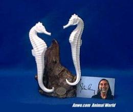 white seahorse figurine statue pair by john perry